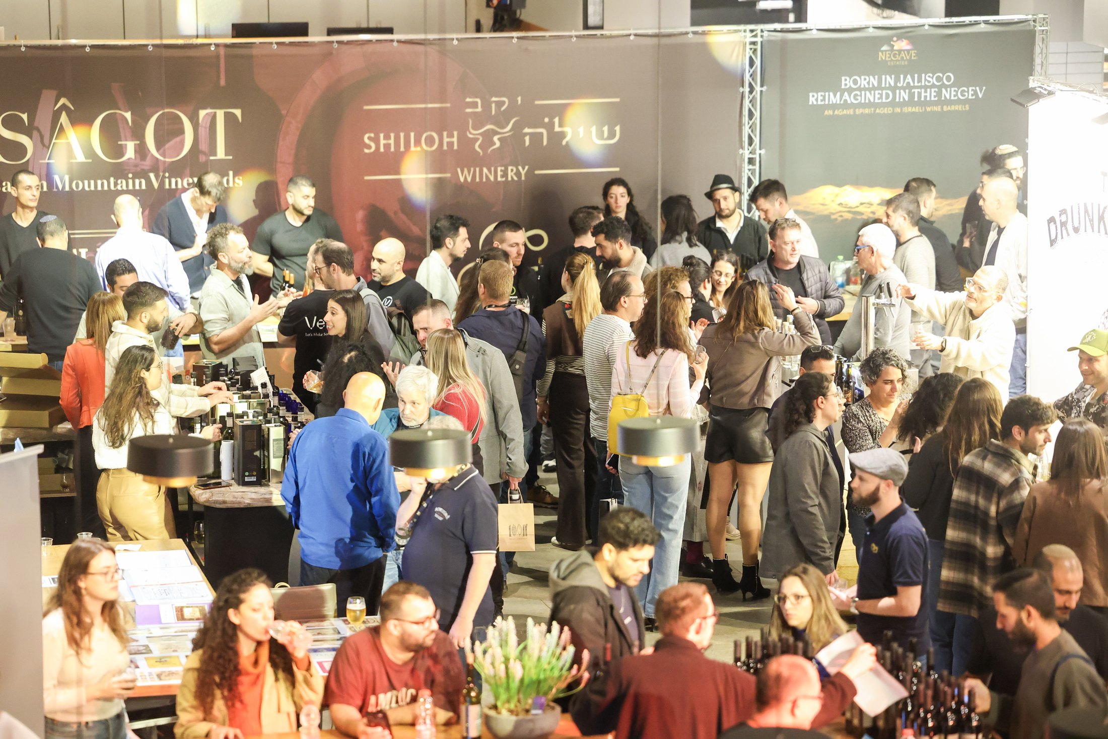 Elevated view of a crowded exhibition area.